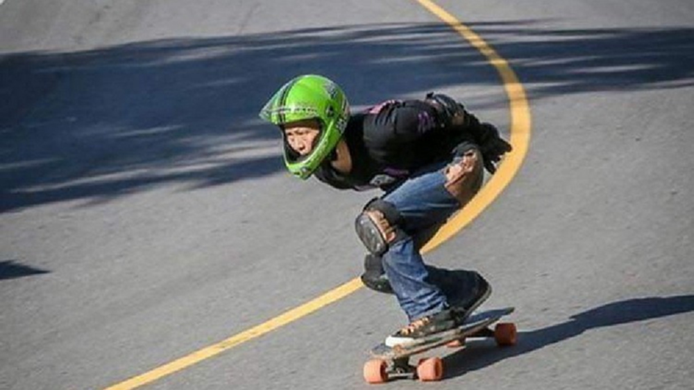 จากอดีตผู้ป่วยมะเร็ง  สู่นักกีฬาลองบอร์ดดาวน์ฮิลล์ทีมชาติไทย