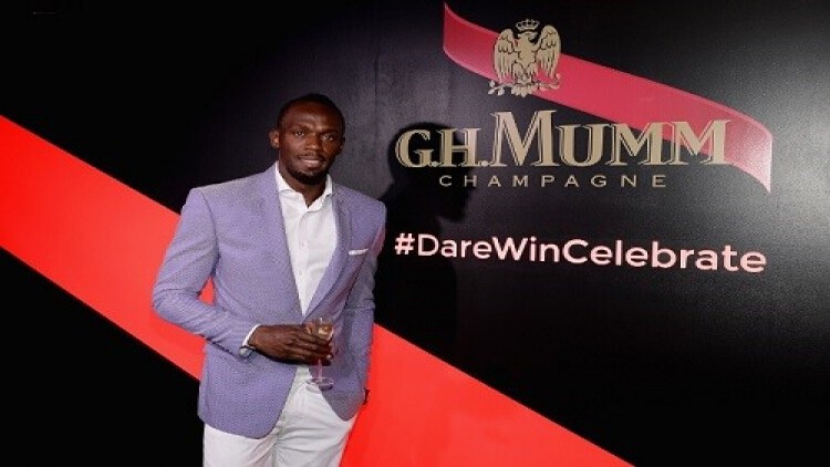 ยูเซน โบลต์ ซีอีโอ Maison Mumm ฉลองความสำเร็จการแข่งขัน