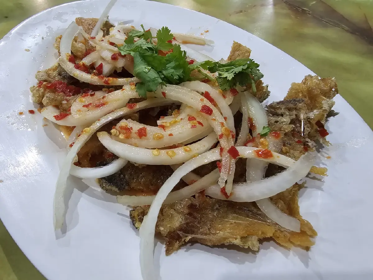 ‘มะระผัดไข่’ รสชาติถูกใจที่ ‘กอชุนฮวด’ ร้านข้าวต้ม มิชลิน 4 ปีซ้อน