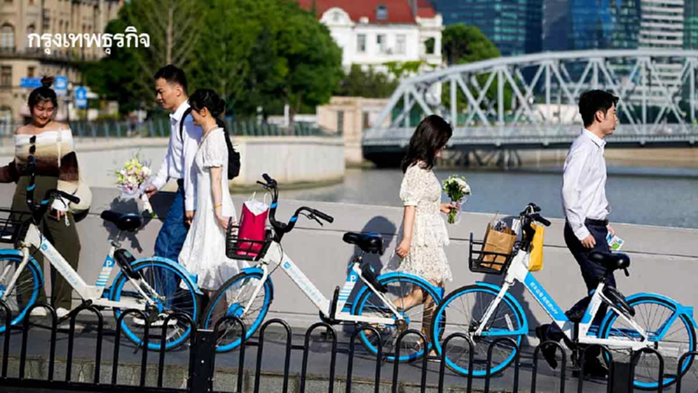 เศรษฐกิจตกต่ำ-การเงินเครียด  คิวหย่าจีนแน่น ต้องจ้างตัวแทนกดบัตรคิว